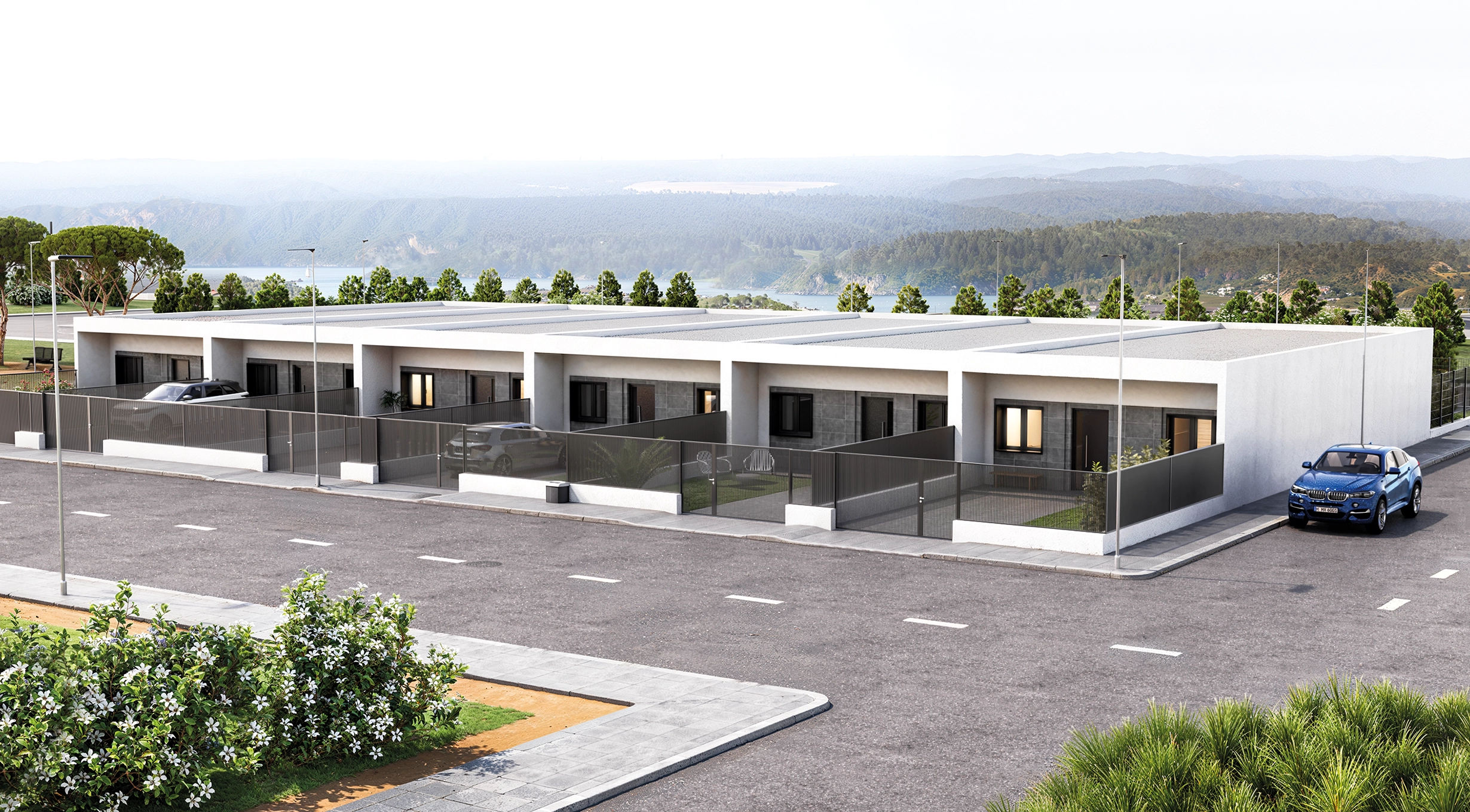 Casas prefabricadas adosadas con paisaje natural al fondo